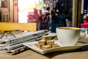 coffee cup with newspaper