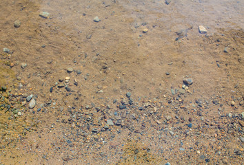 Clay sand underwater in the lake.
