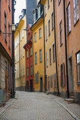 Fototapeta na wymiar Narrow street in the old part of Stockholm. Sweden