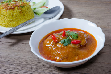 Chicken massaman curry with cooked turmeric jasmine rice