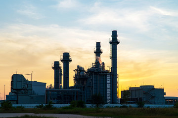 Fototapeta na wymiar Petrochemical plant at sunset, Twilight and Night.