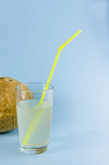 useful drink. coconut milk with a tube. coconut