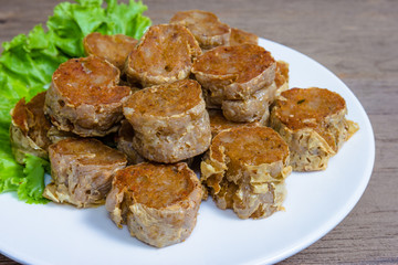  Deep Fried Crab meat roll or Hoi jo on wood  background