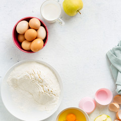 Baking food ingredients on a white background top view