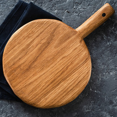 Empty wooden cutting board top view