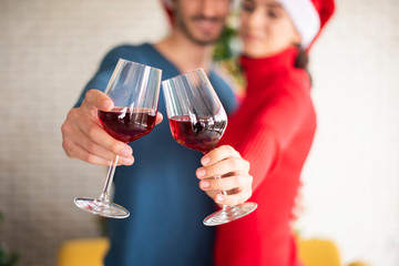 Attractive Caucasian couple of love are  celebrating Christmas in home