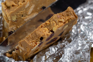Caramel nougat with nuts, raisins and coffee