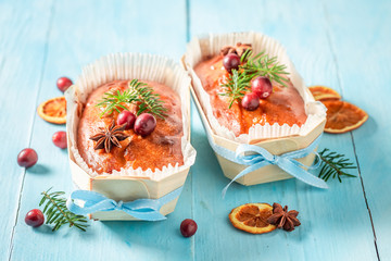 Delicious and homemade Fruitcake for Christmas on blue table