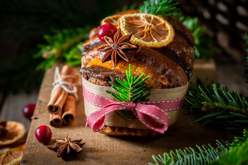 Homemade orange gingerbread for Christmas on wooden table