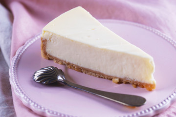 cheesecake in a pink saucer
