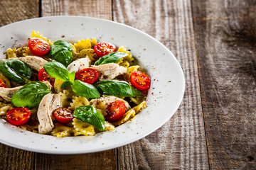 Tagliatelle with boiled chicken breast and pesto