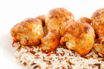 Indian cuisine: roasted chicken with rice and vegetables.