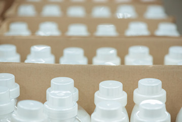 Package of detergent bottles abstract background.