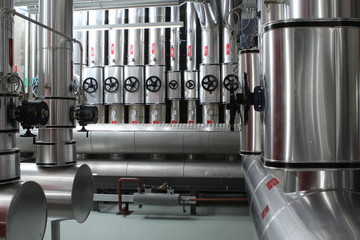 chrome pipes in heating and AC rooms in buildings of factories and hospital