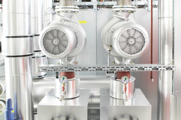 chrome pipes in heating and AC rooms in buildings of factories and hospital