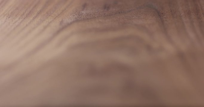 Focus pull of oil finished black walnut wood surface