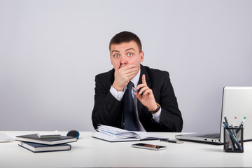 Office, finances, internet, business, success and people concept-Businessman closing mouth with hands