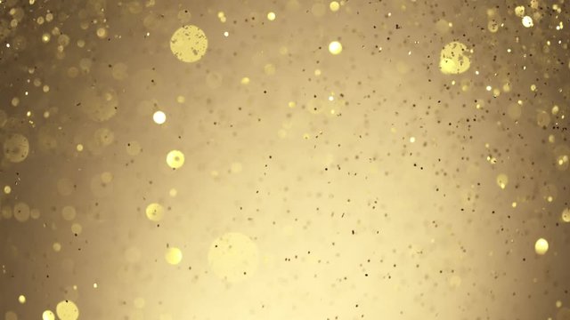 Golden Glitter Background in Super Slow Motion at 1000fps. Shooted with High Speed Cinema Camera in 4K Resolution