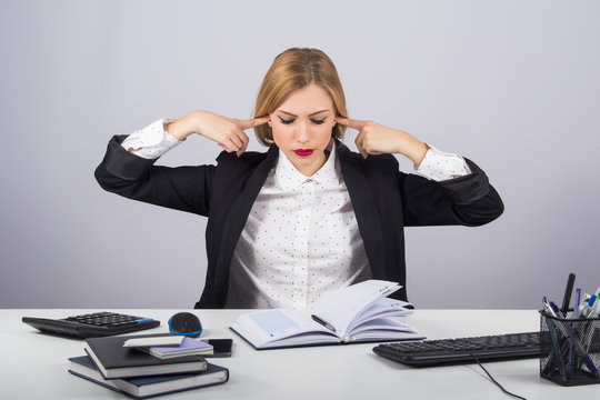 Office, finances, internet, business, success and people concept- Stressed businesswoman covering her ears with hands