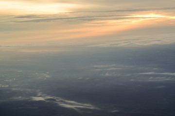 Fototapeta na wymiar sunrise above clouds
