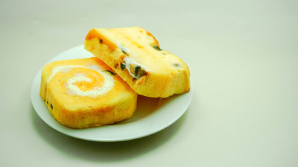 Rotten cake, Mold cake, bacterial cake, Cake on a white plate is moldy.