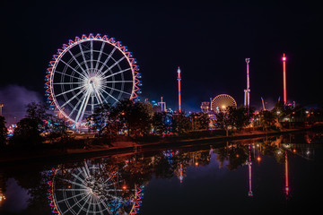 Ferris Wheel at Volksfest, Cannstatter Wasen, Stuttgart Germany - obrazy, fototapety, plakaty