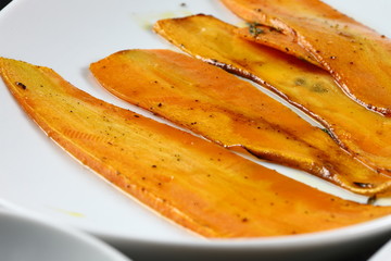 food plates on table top, ready to served for guests in a dark setting