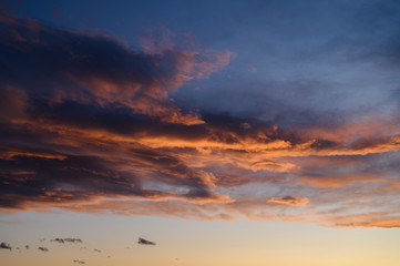 Obraz premium Dramatic sky with orange clouds. Nature background.