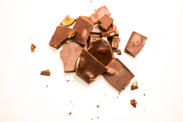 chocolate pieces pile with almonds isolated