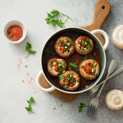 Mushrooms stuffed with mince and tomatoes