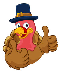 Pilgrim Turkey Thanksgiving bird animal cartoon character wearing a pilgrims hat giving a thumbs up
