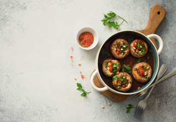 Mushrooms stuffed with mince and tomatoes