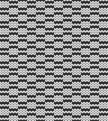 Geometric black and white pattern. Imitation knitting or embroidery. Seamless background. Jacquard.