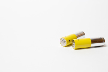 yellow batteries isolated on white background