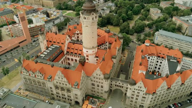 Aerial View of New Town Hall - Neues Rathaus - Monumental Building in style of German Late Renaissance in Leipzig's Old Town, Germany, Europe. 4K Background Amazing Drone Pull out Shot