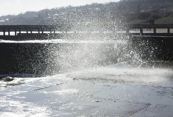 breaking waves which hit the shore