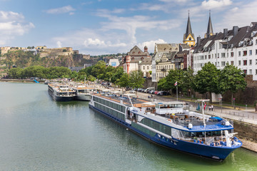 Cruise ships in front of the skyline of Koblenz, Germany - obrazy, fototapety, plakaty