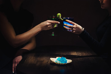 man drinking cocktail