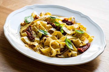 Pasta with sauce and sun-dried tomatoes