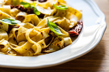 Pasta with sauce and sun-dried tomatoes