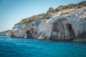Fototapeta na wymiar Blue caves on Zakynthos island, Greece. Famous caves with crystal clear waters on Zakynthos island.