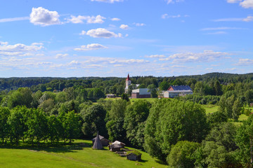 Church on hill in village. Rural landscape. Top view