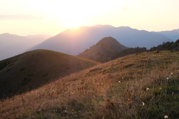 View around peak Lomis Mta in Borjomi-Kharagauli National Park, Georgia. Amazing autumn colours in evening sunlight.