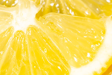Fresh juicy yellow lemon as an abstract background