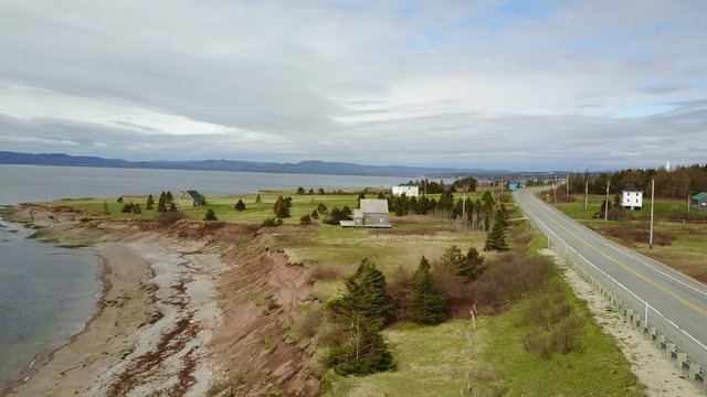 Aerial shot of some houses in the coast of Gasp&eacute;, Quebec, Canada.