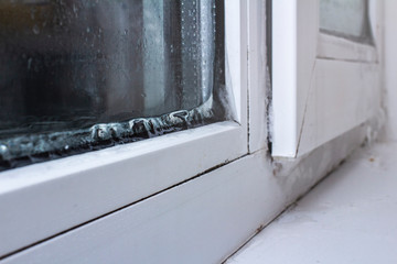 the problem of freezing of plastic Windows in the winter time, the front and background blurred with the bokeh effect
