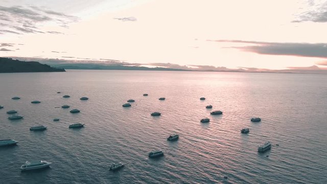 Copacabana, Bolivia - August 2019: Panoramic aerial DRONE Lake Titicaca view. Cityscape with water, hills, buildings, town. Bolivian tourism. Lakeside city of town. Harbor with boats. Travel. 2019