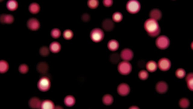 Circular motion of round blurred balls on black background HD 1920