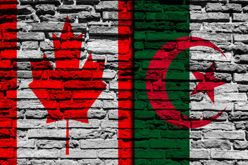 Flag of Algeria and Canada on brick wall