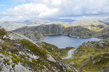 Obraz premium Beautiful magic traffic roads in the Norwegian mountains. Wonderful scenery.